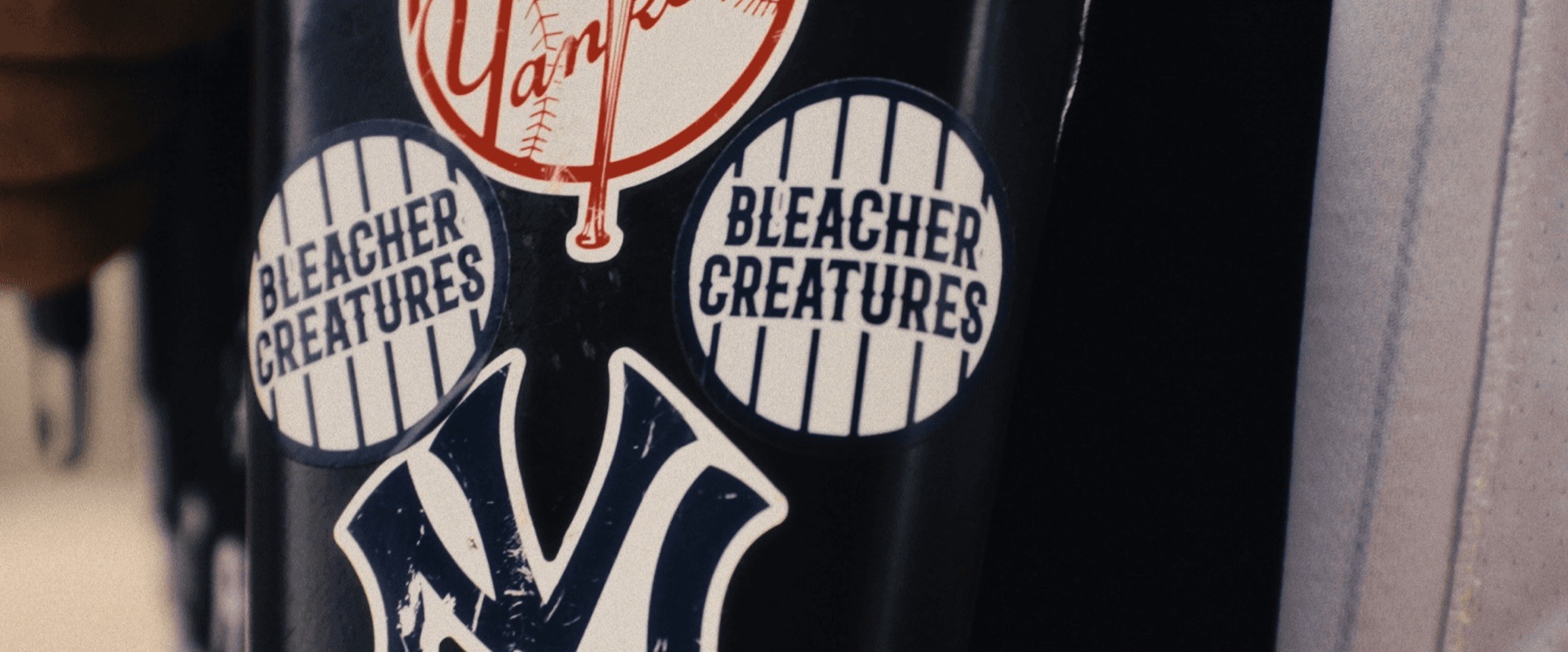 Badges and memorabilia from The Bleacher Creatures